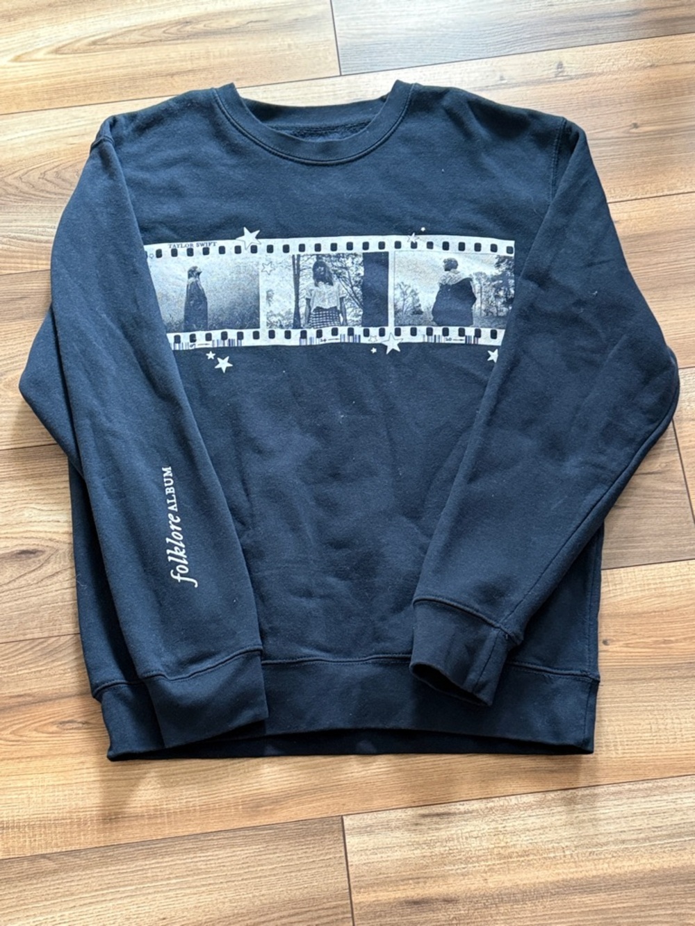 Taylor Swift Black Crewneck Sweatshirt with Monochrome Filmstrip Graphic
